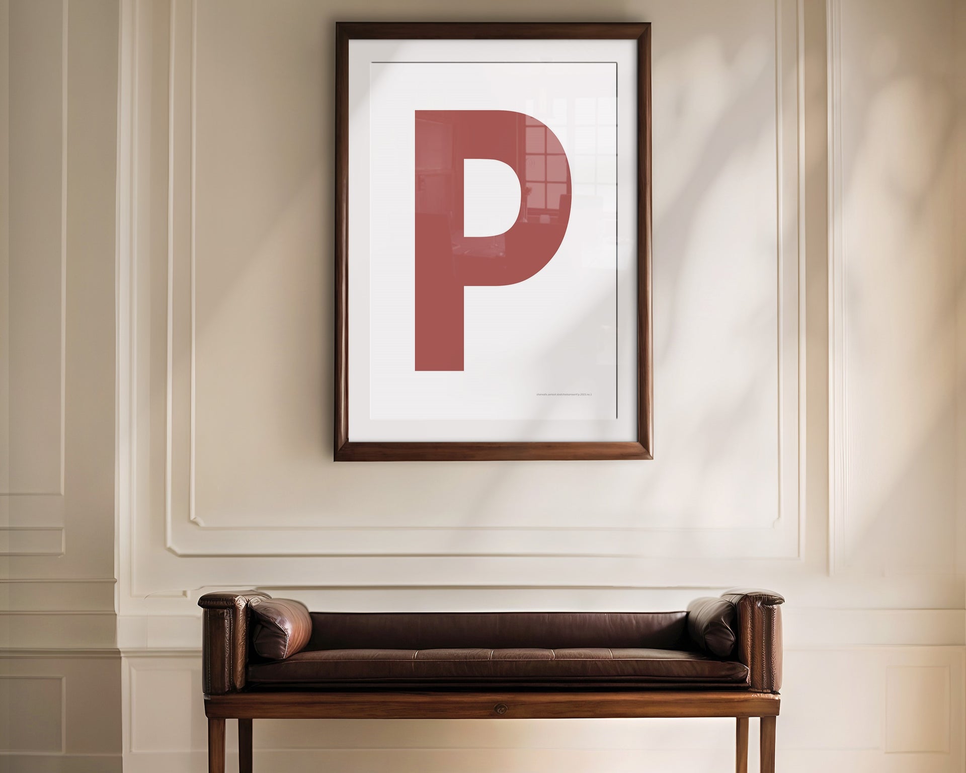 Oversized Nantucket red and white letter art print haning above a bence in a formal entryway or hallway.