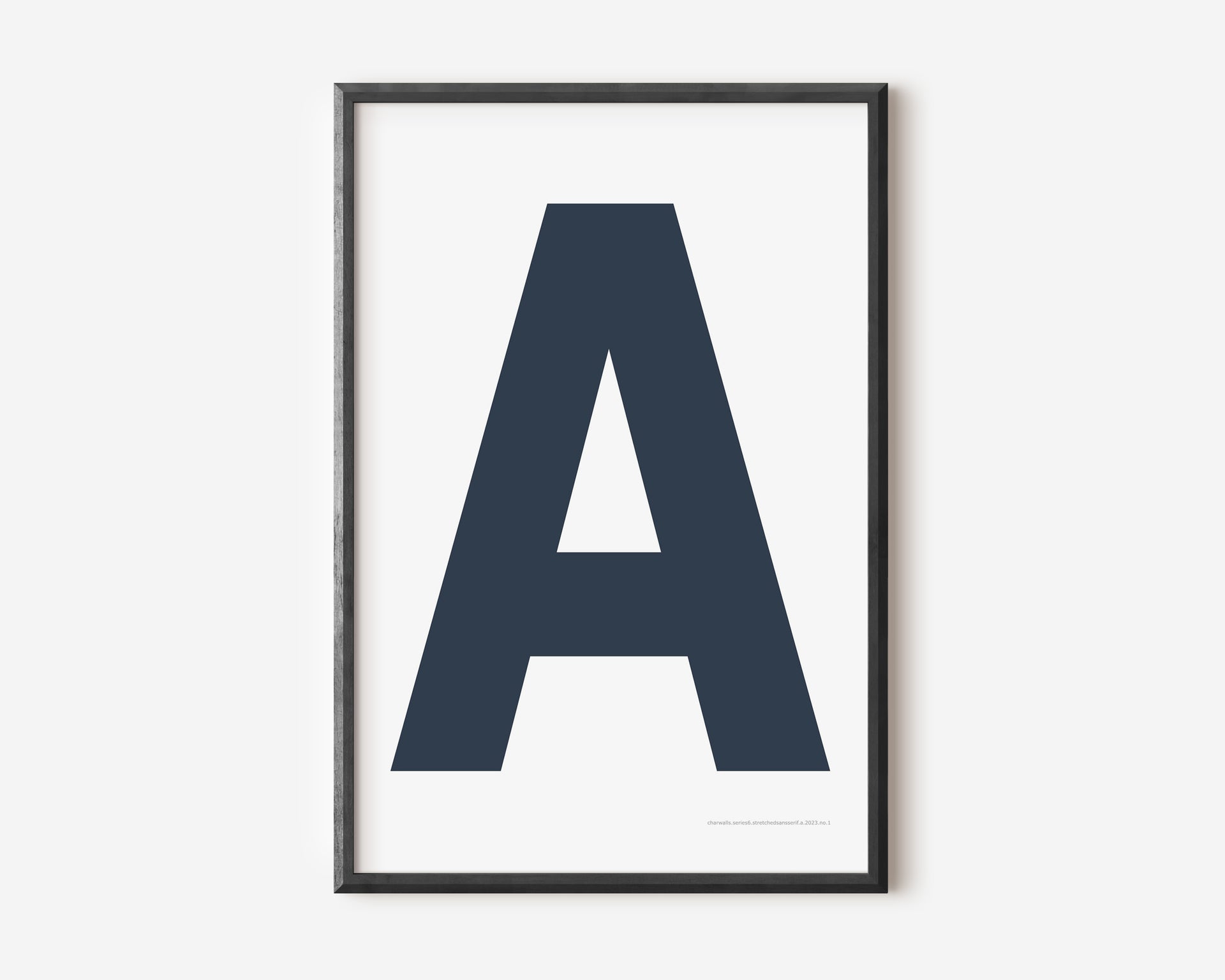 Modern art print with an uppercase navy blue letter A on a white background.