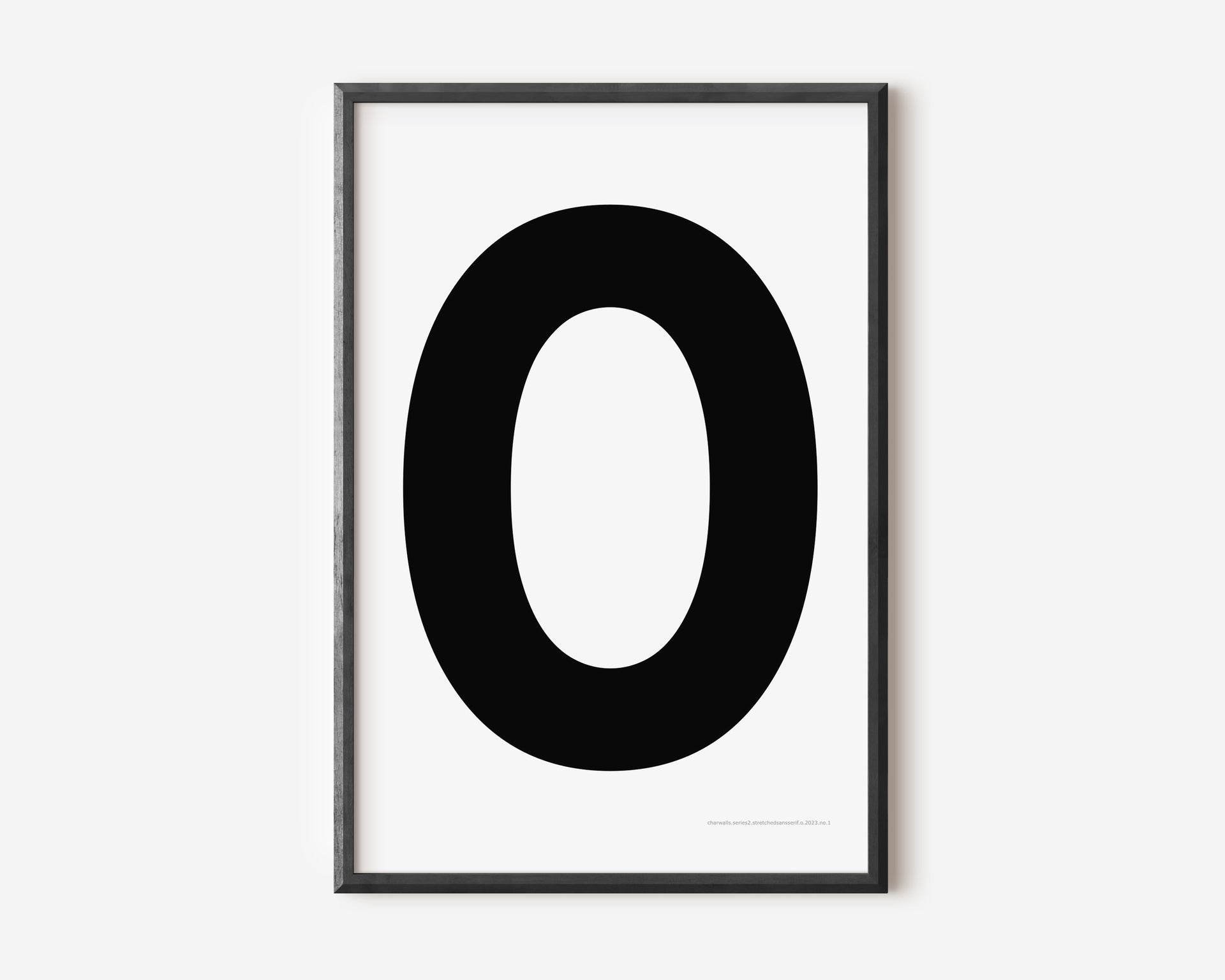 Modern art print with an uppercase black letter O on a white background.