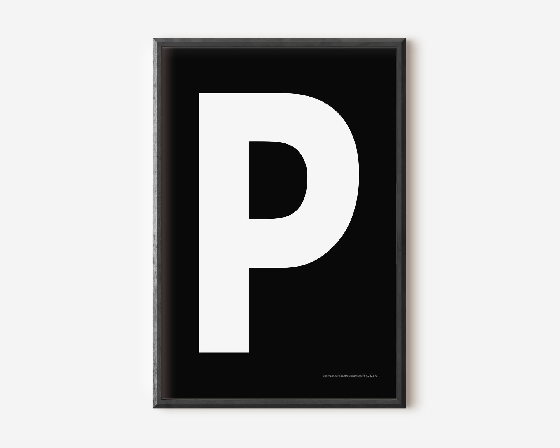 Modern art print with an uppercase white letter P on a black background.