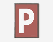 Modern art print with an uppercase white letter P on a Nantucket red background.