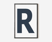 Modern art print with an uppercase navy blue letter R on a white background.