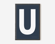 Modern art print with an uppercase white letter U on a navy blue background.