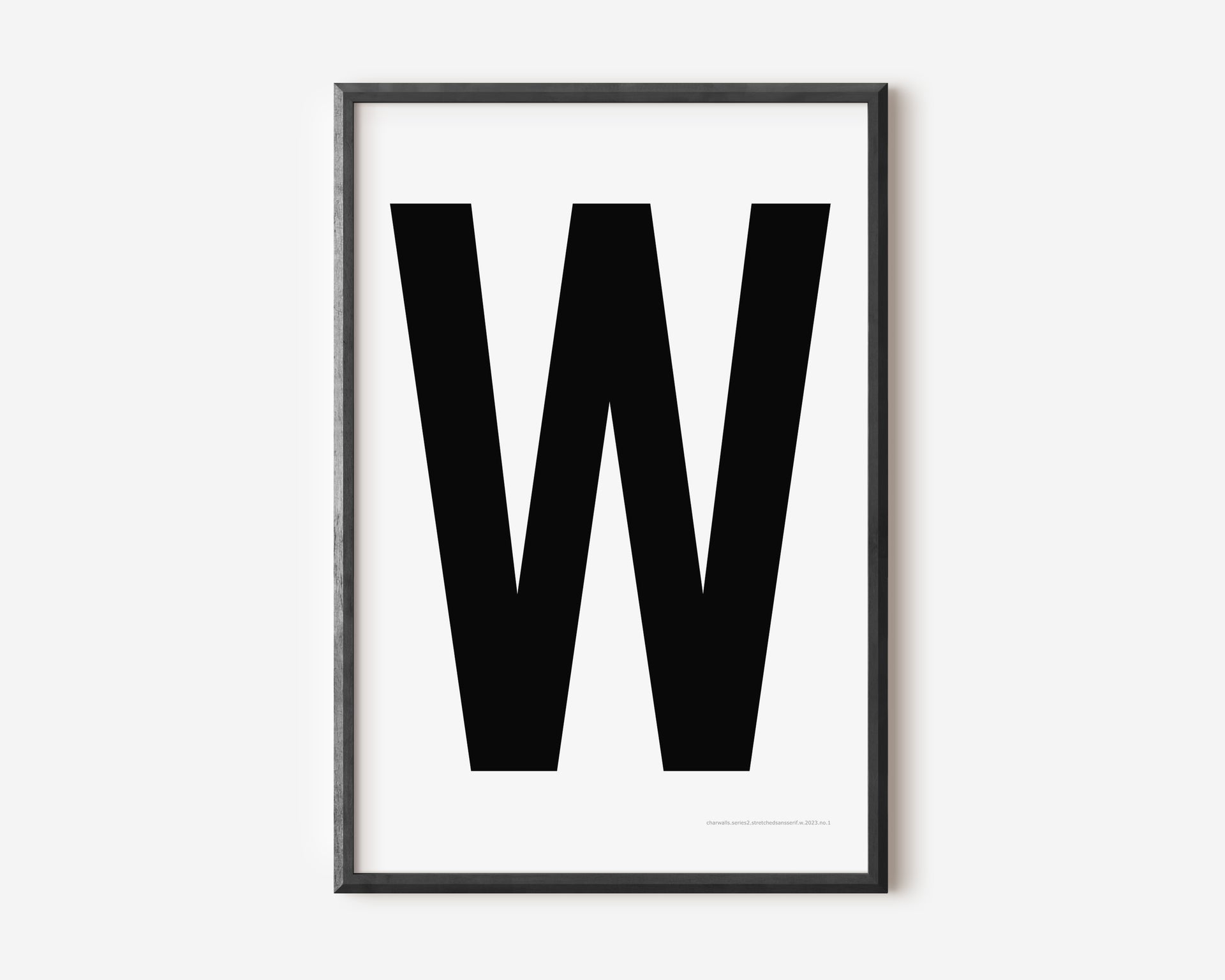 Modern art print with an uppercase black letter W on a white background.