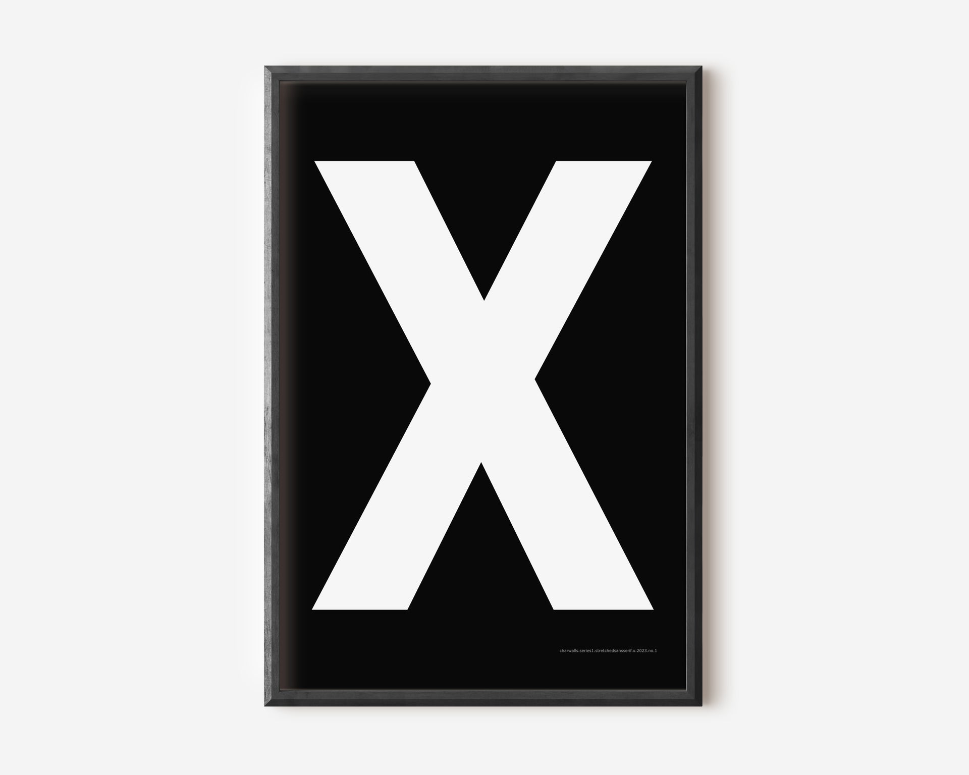 Modern art print with an uppercase white letter X on a black background.