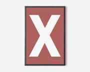 Modern art print with an uppercase white letter X on a Nantucket red background.