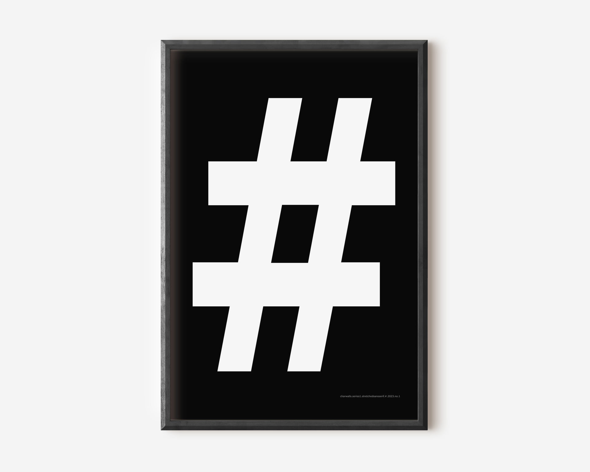 Modern symbol art print with a white number sign on a black background.