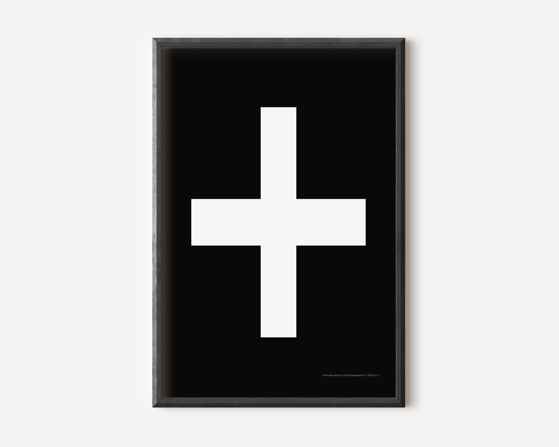 Modern symbol art print with a white plus sign on a black background.