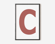 Modern art print with an uppercase Nantucket red letter C on a white background.