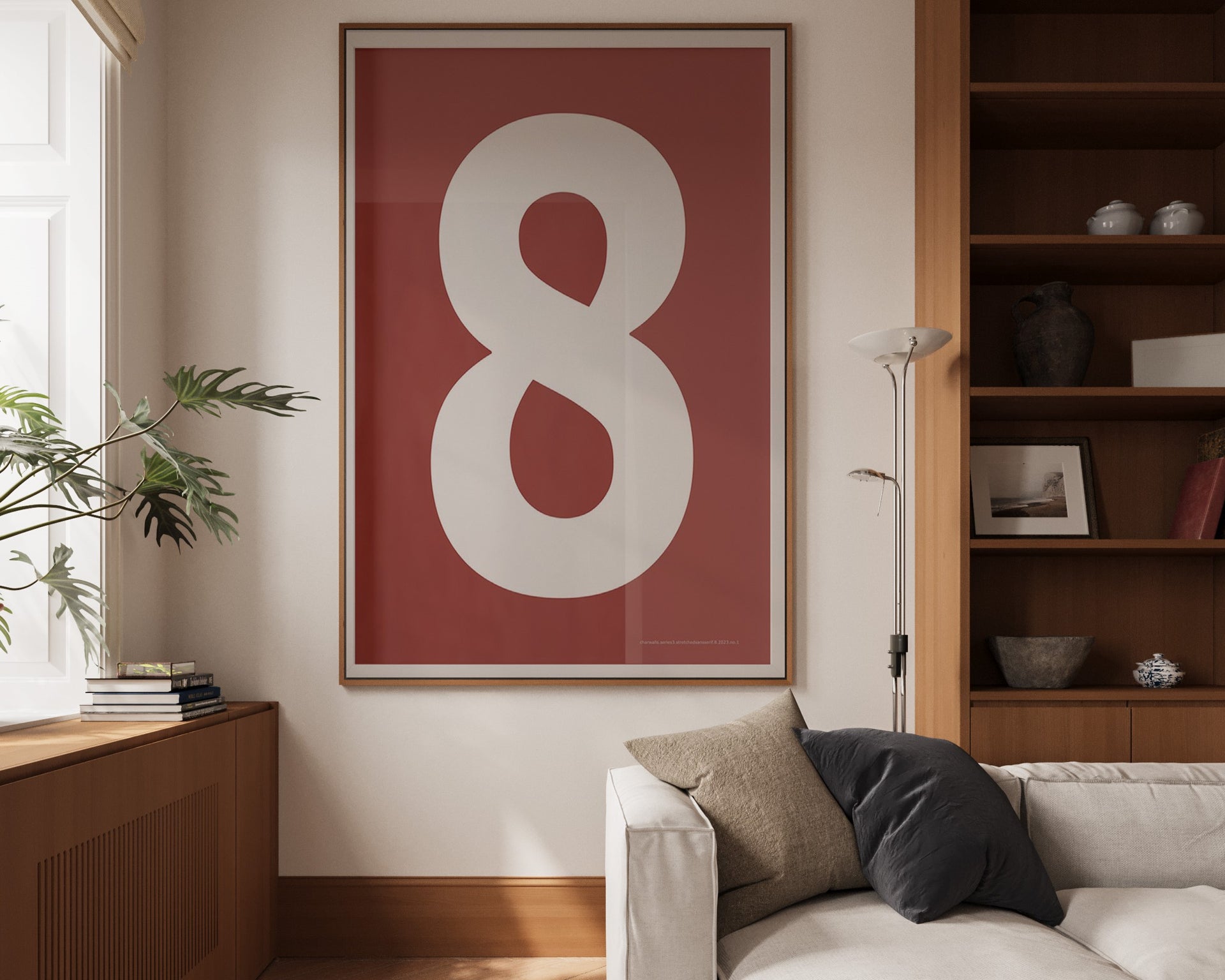Oversized framed Nantucket red and white number art print featuring the number 8 in a modern living room.