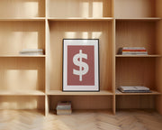 Framed Nantucket red and white dollar sign art print leaning on a shelf.