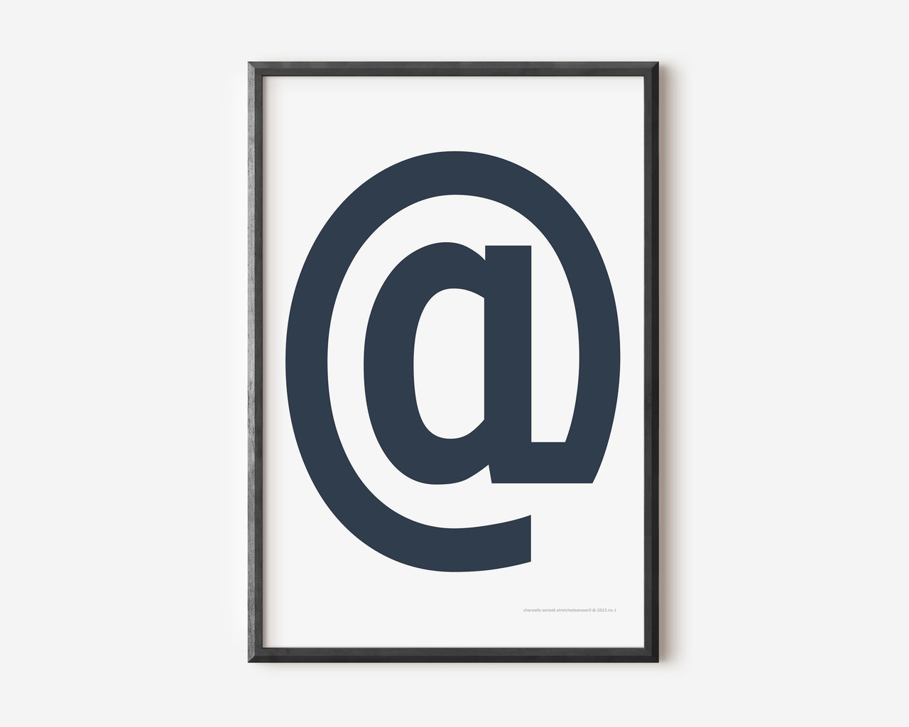 Modern symbol art print with a navy blue at sign on a white background.