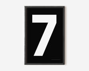 Modern number 7 art print with a white seven on a black background.