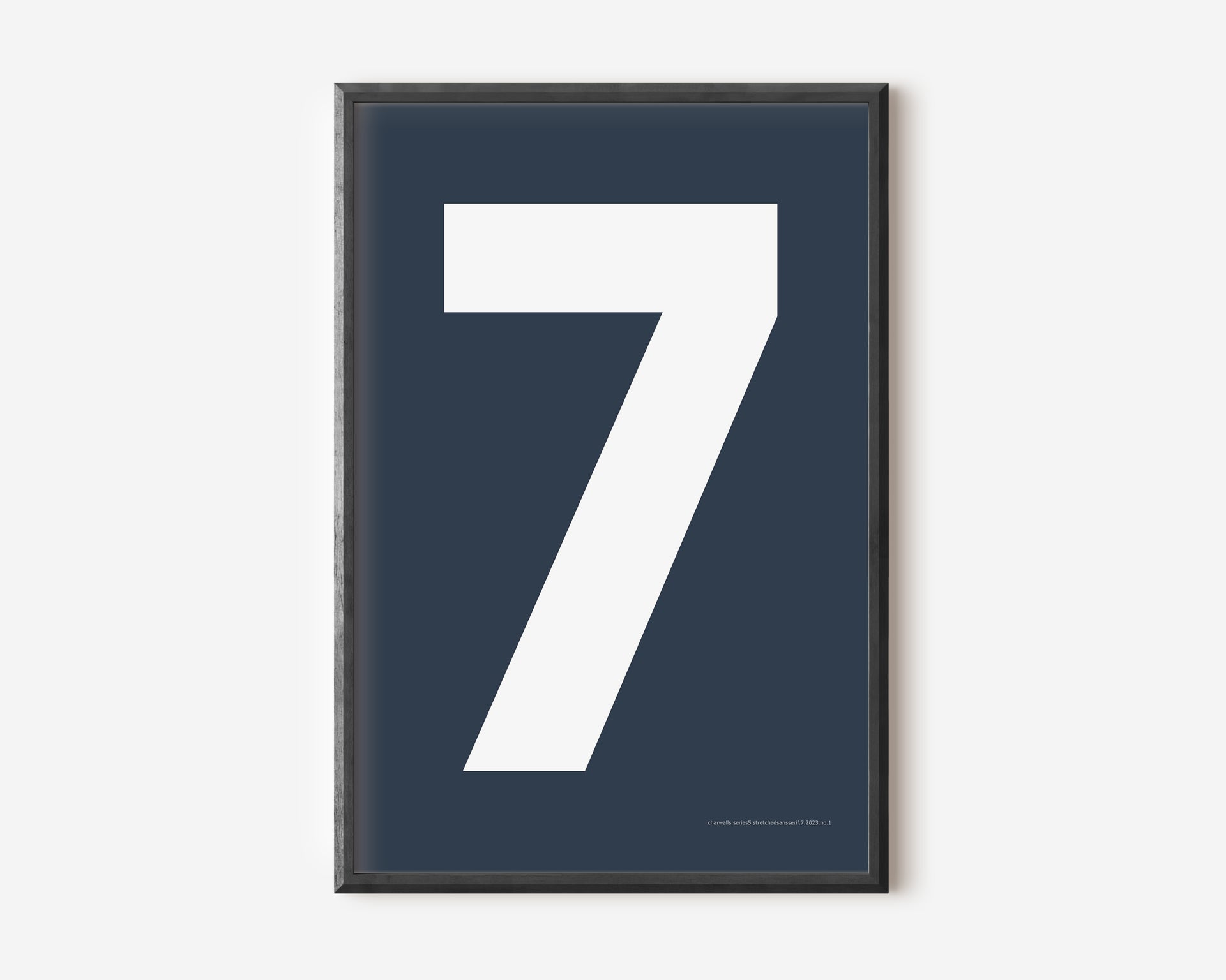 Modern number 7 art print with a white seven on a navy blue background.