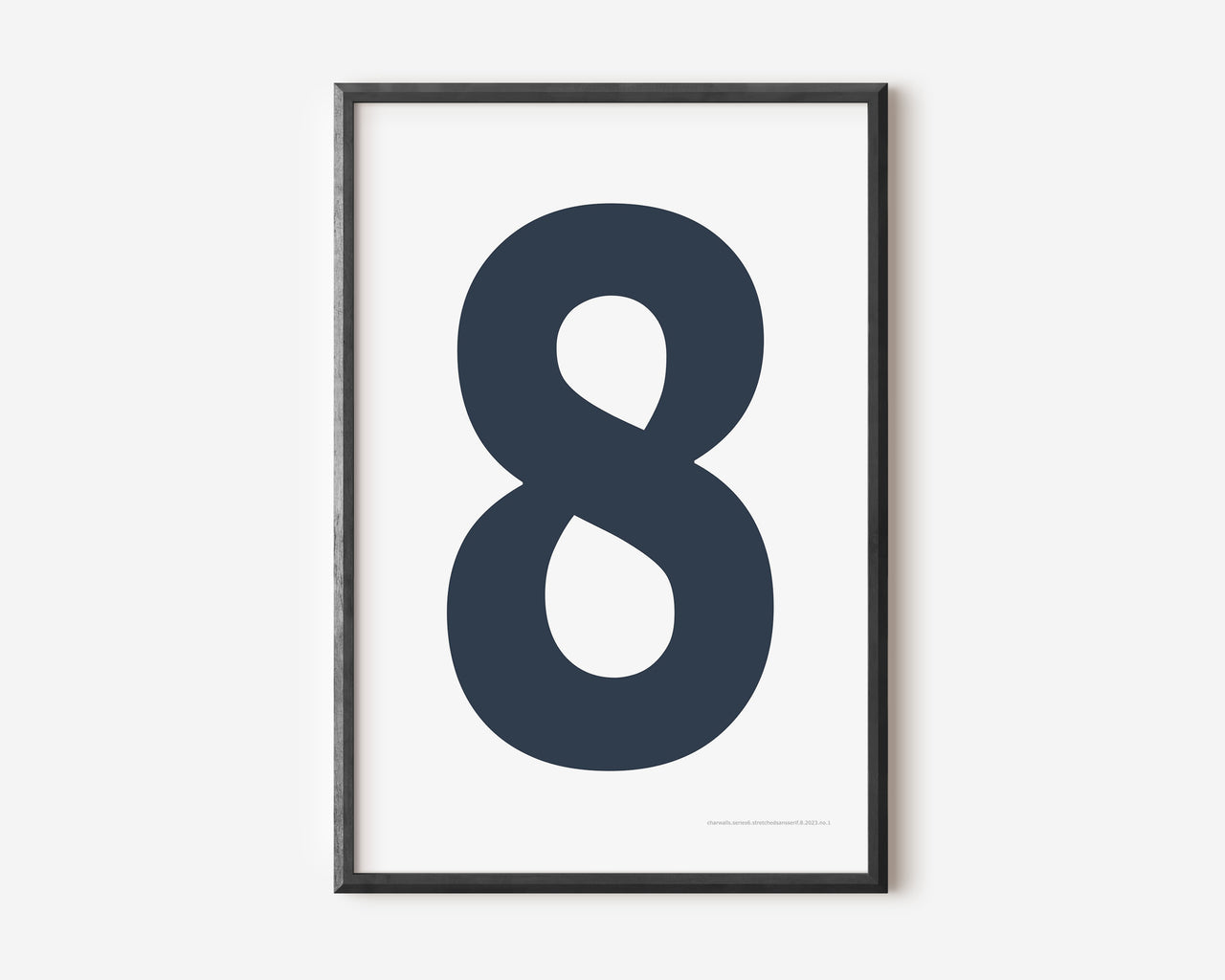 Modern number 8 art print with a navy blue eight on a white background.