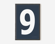 Modern number 9 art print with a white nine on a navy blue background.