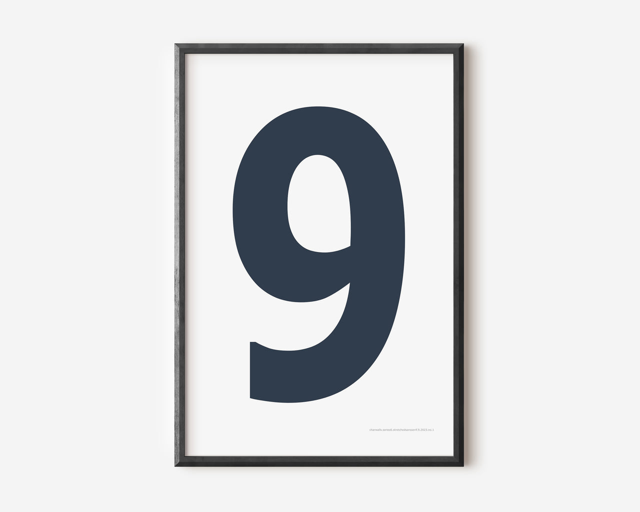 Modern number 9 art print with a navy blue nine on a white background.
