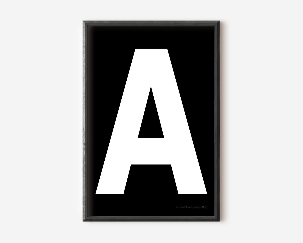 Modern art print with an uppercase white letter A on a black background.