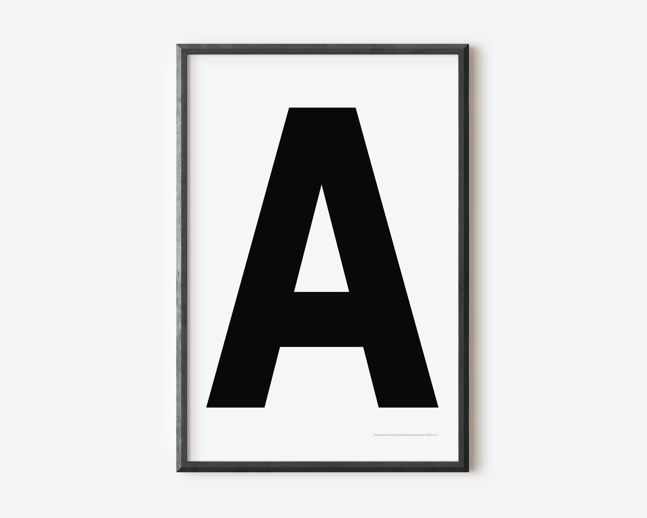 Modern art print with an uppercase black letter A on a white background.