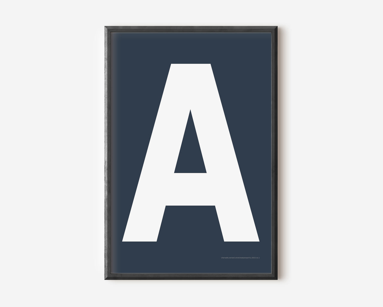 Modern art print with an uppercase white letter A on a navy blue background.