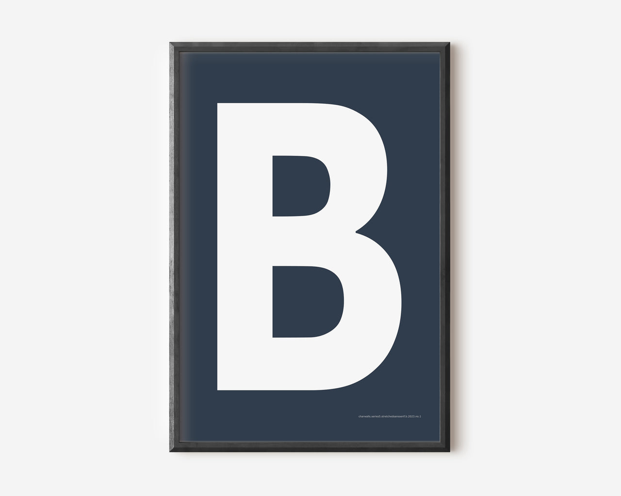 Modern art print with an uppercase white letter B on a navy blue background.