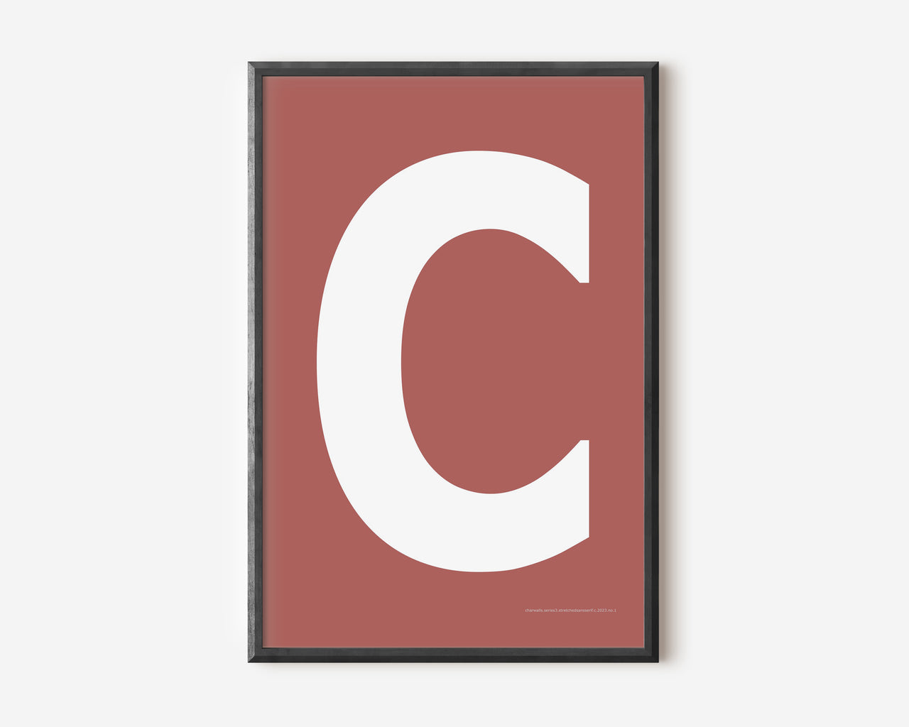 Modern art print with an uppercase white letter C on a Nantucket red background.
