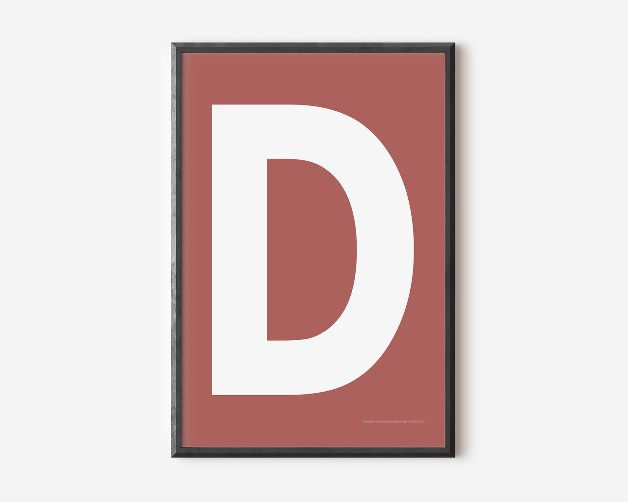 Modern art print with an uppercase white letter D on a Nantucket red background.