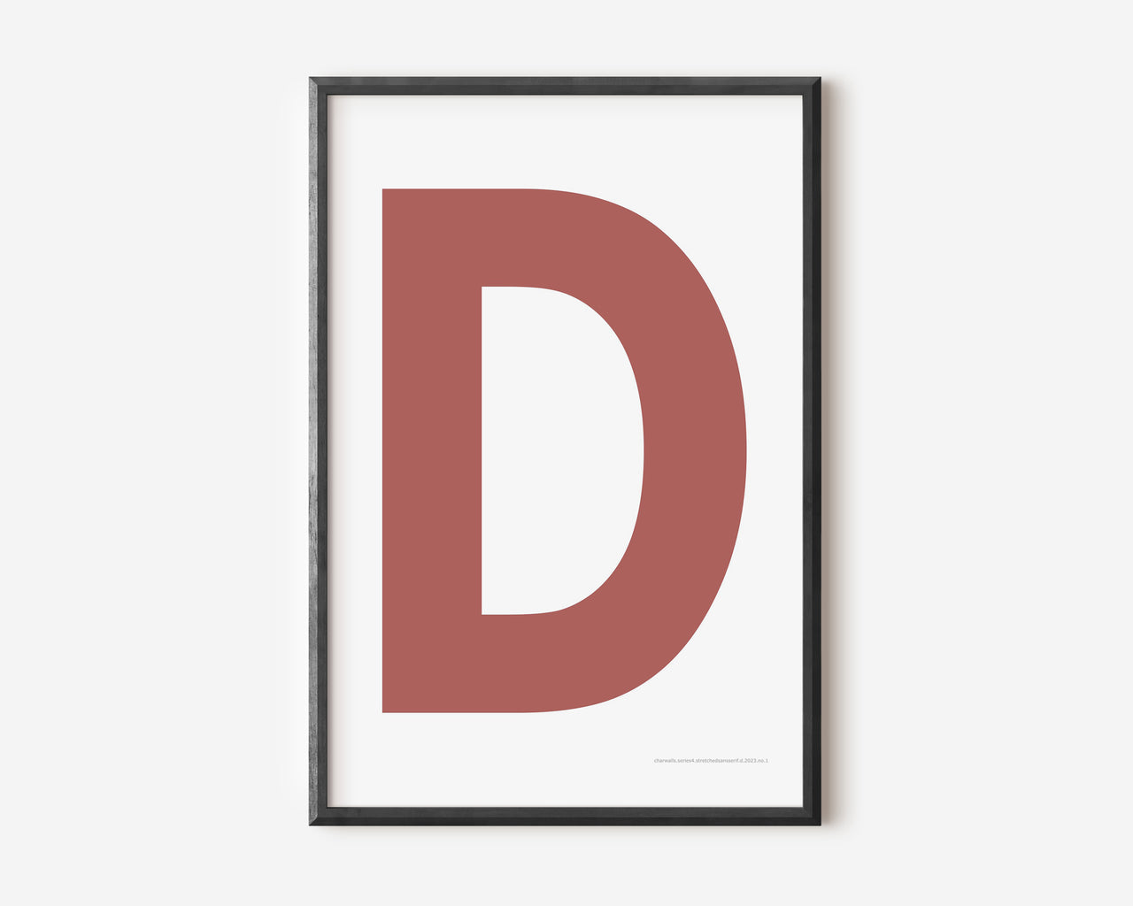 Modern art print with an uppercase Nantucket red letter D on a white background.