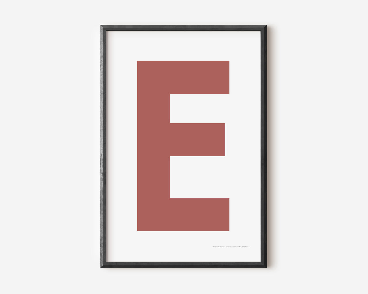 Modern art print with an uppercase Nantucket red letter E on a white background.