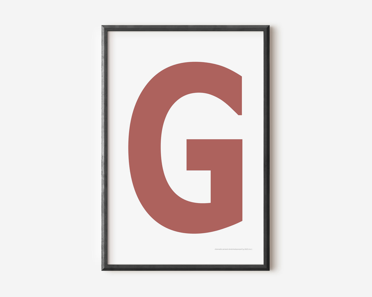Modern art print with an uppercase Nantucket red letter G on a white background.