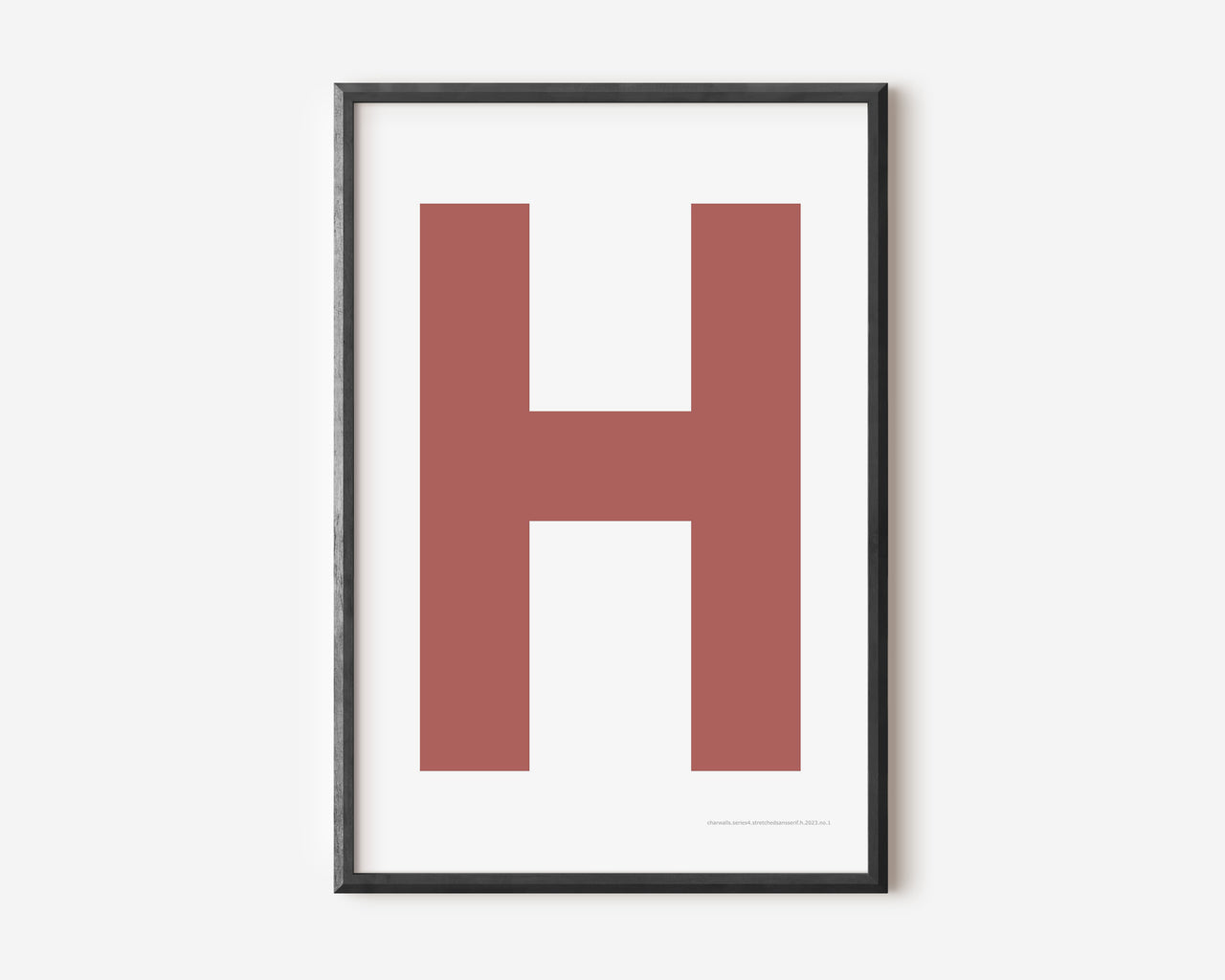 Modern art print with an uppercase Nantucket red letter H on a white background.