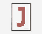 Modern art print with an uppercase Nantucket red letter J on a white background.