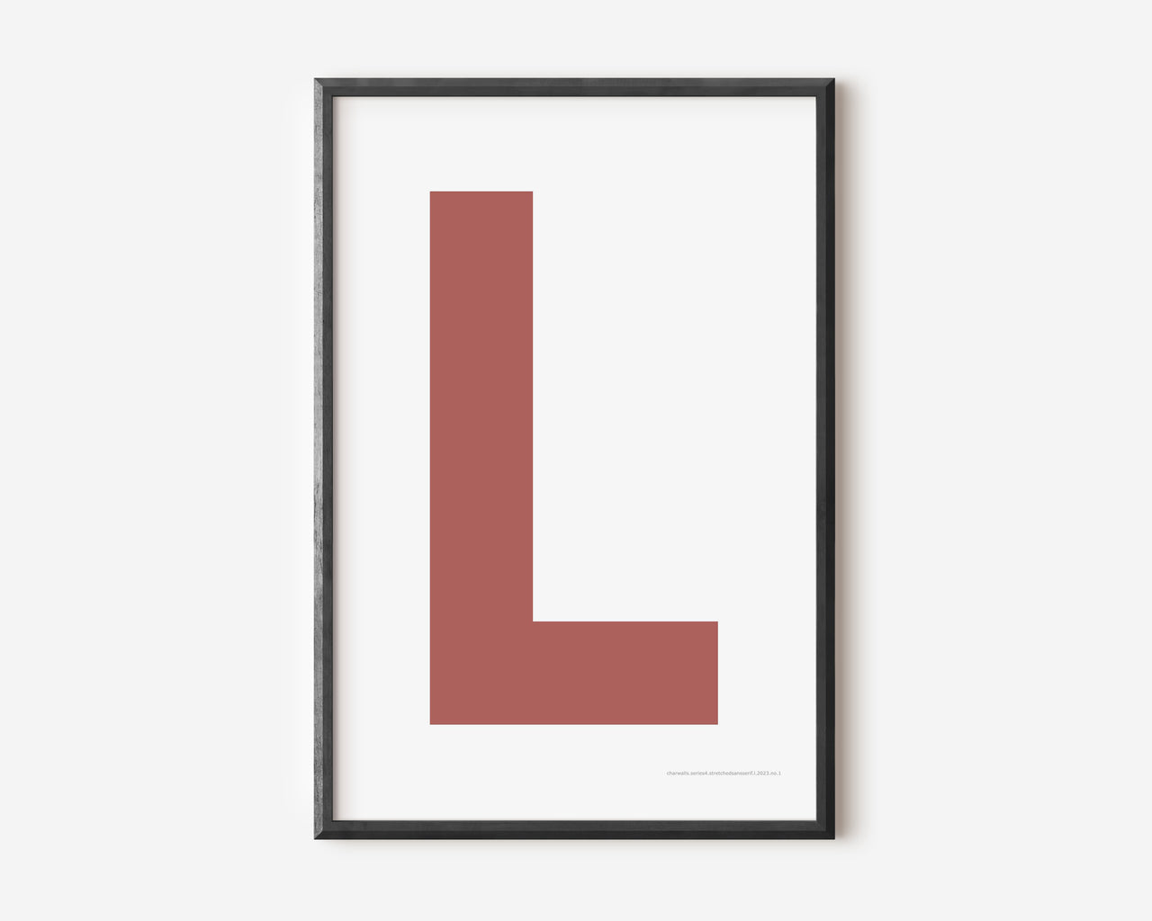 Modern art print with an uppercase Nantucket red letter L on a white background.
