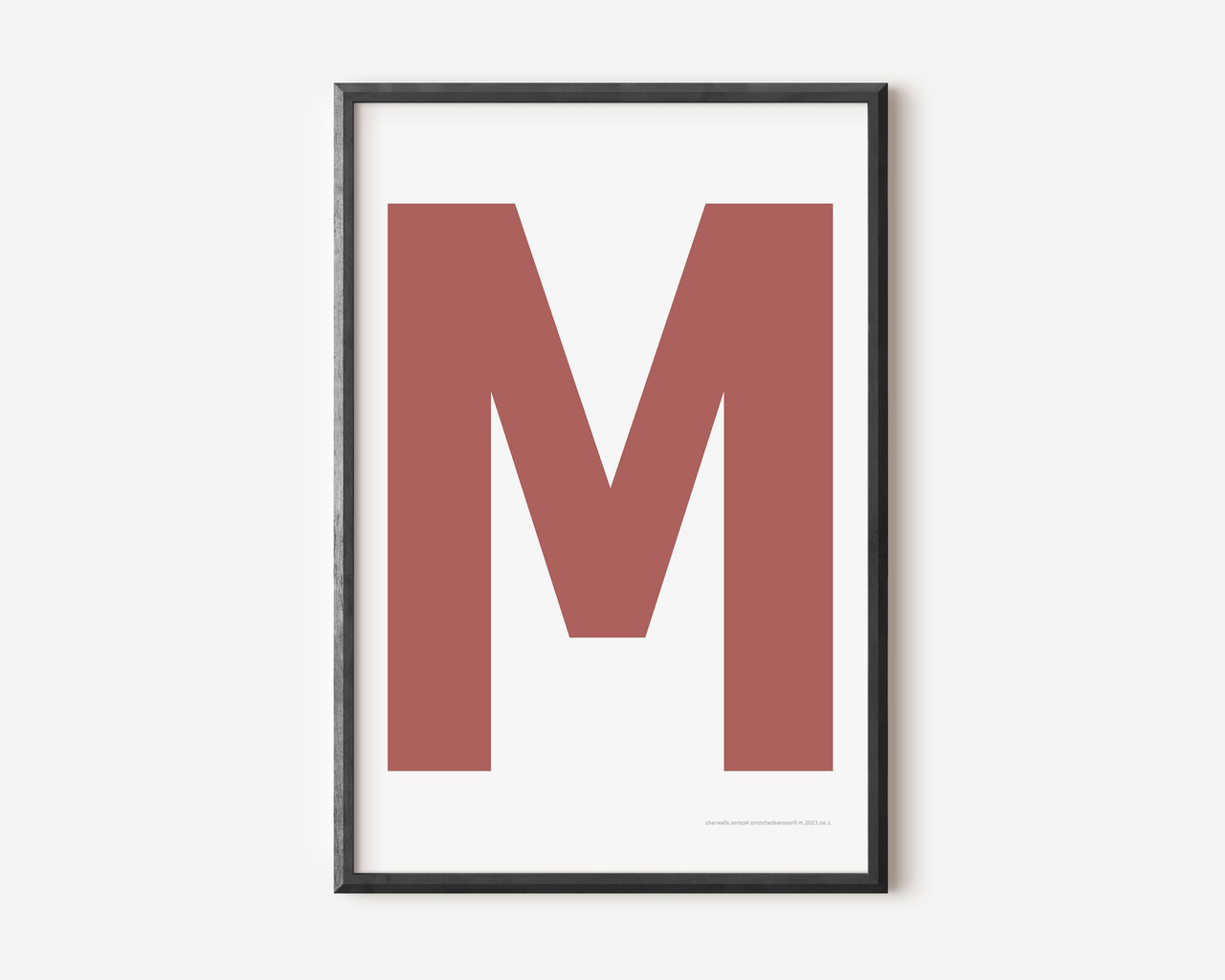Modern art print with an uppercase Nantucket red letter M on a white background.