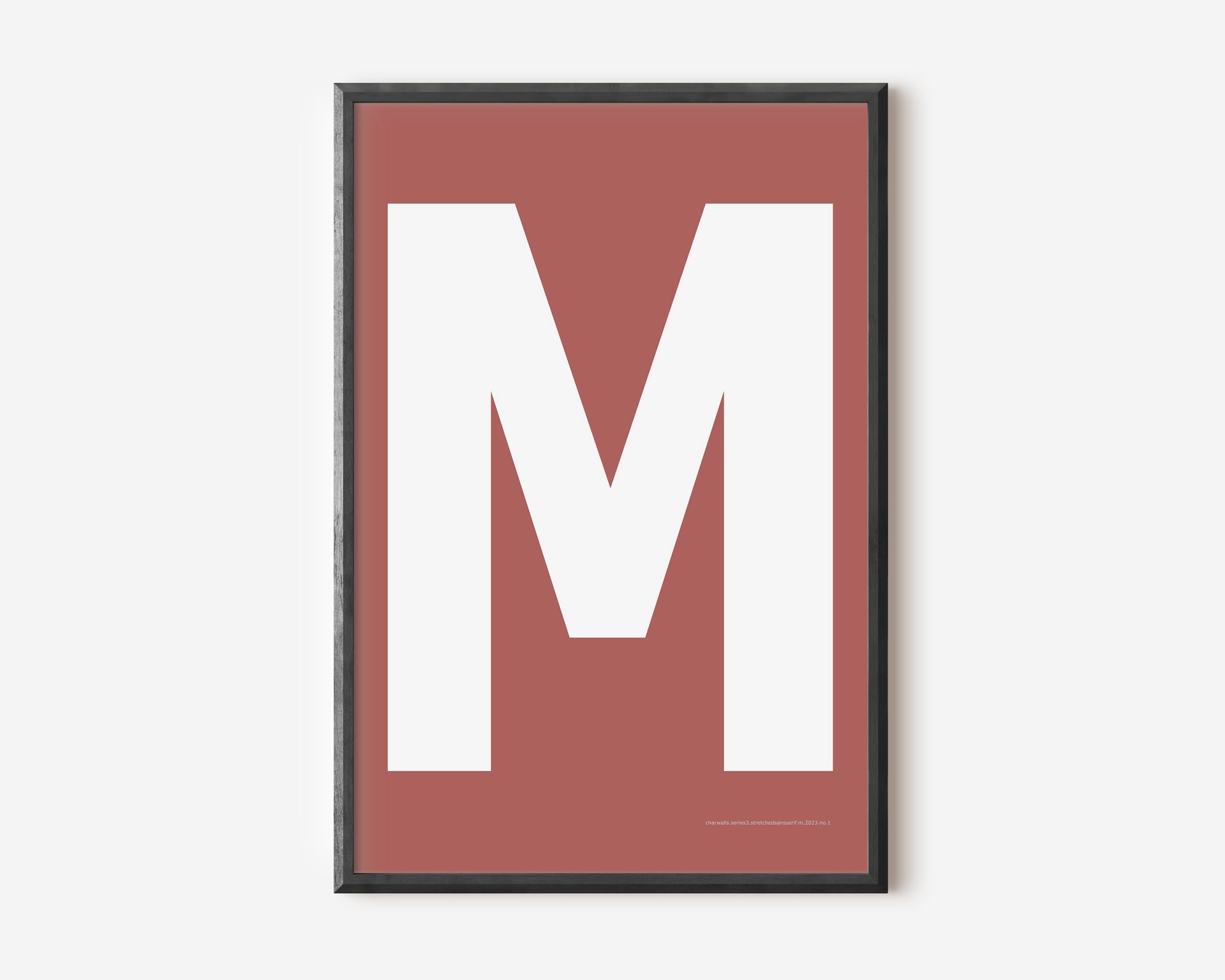 Modern art print with an uppercase white letter M on a Nantucket red background.