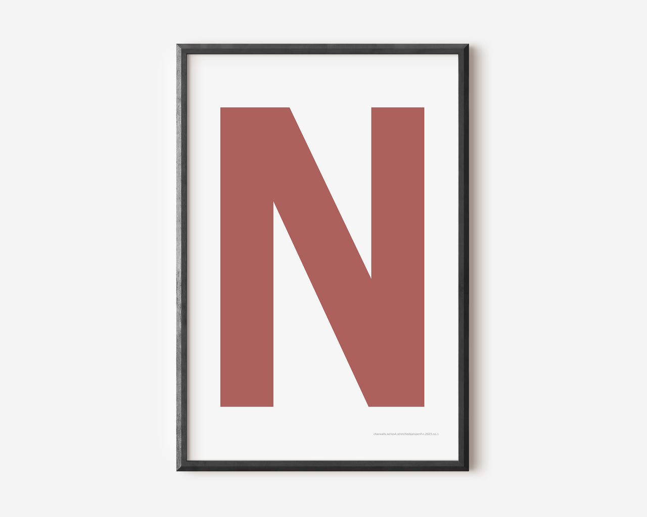 Modern art print with an uppercase Nantucket red letter N on a white background.