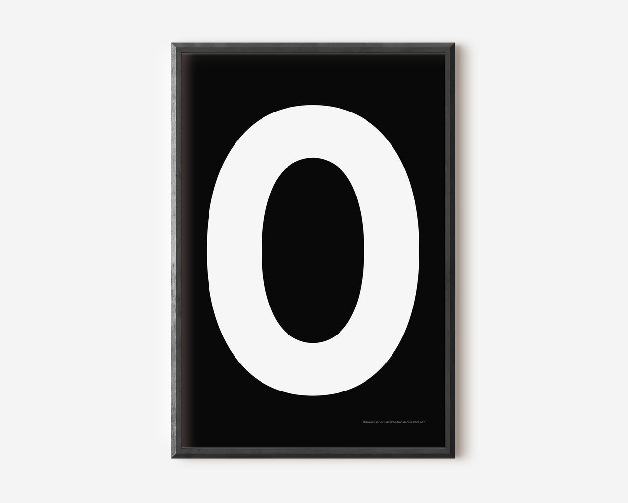 Modern art print with an uppercase white letter O on a black background.