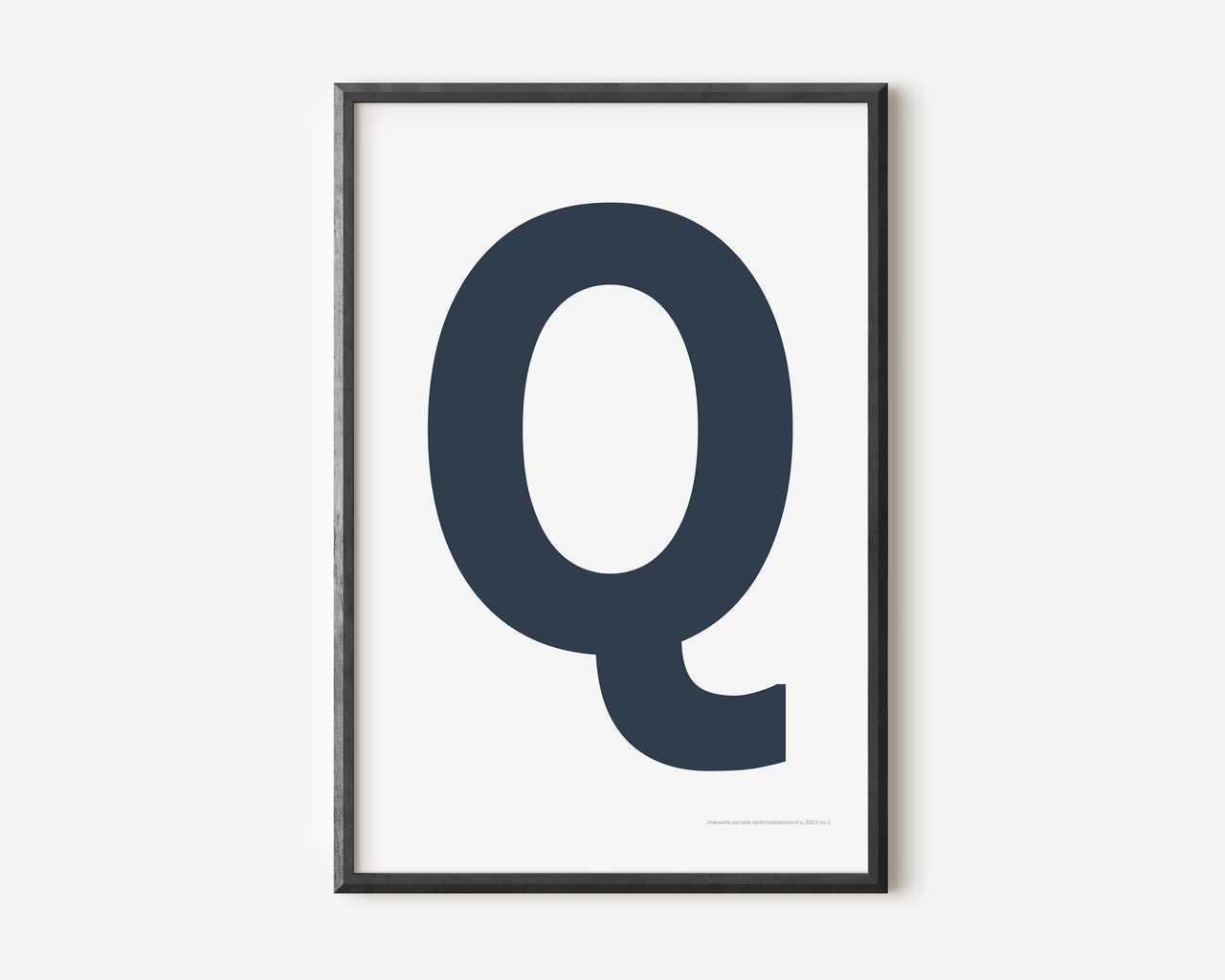 Modern art print with an uppercase navy blue letter Q on a white background.