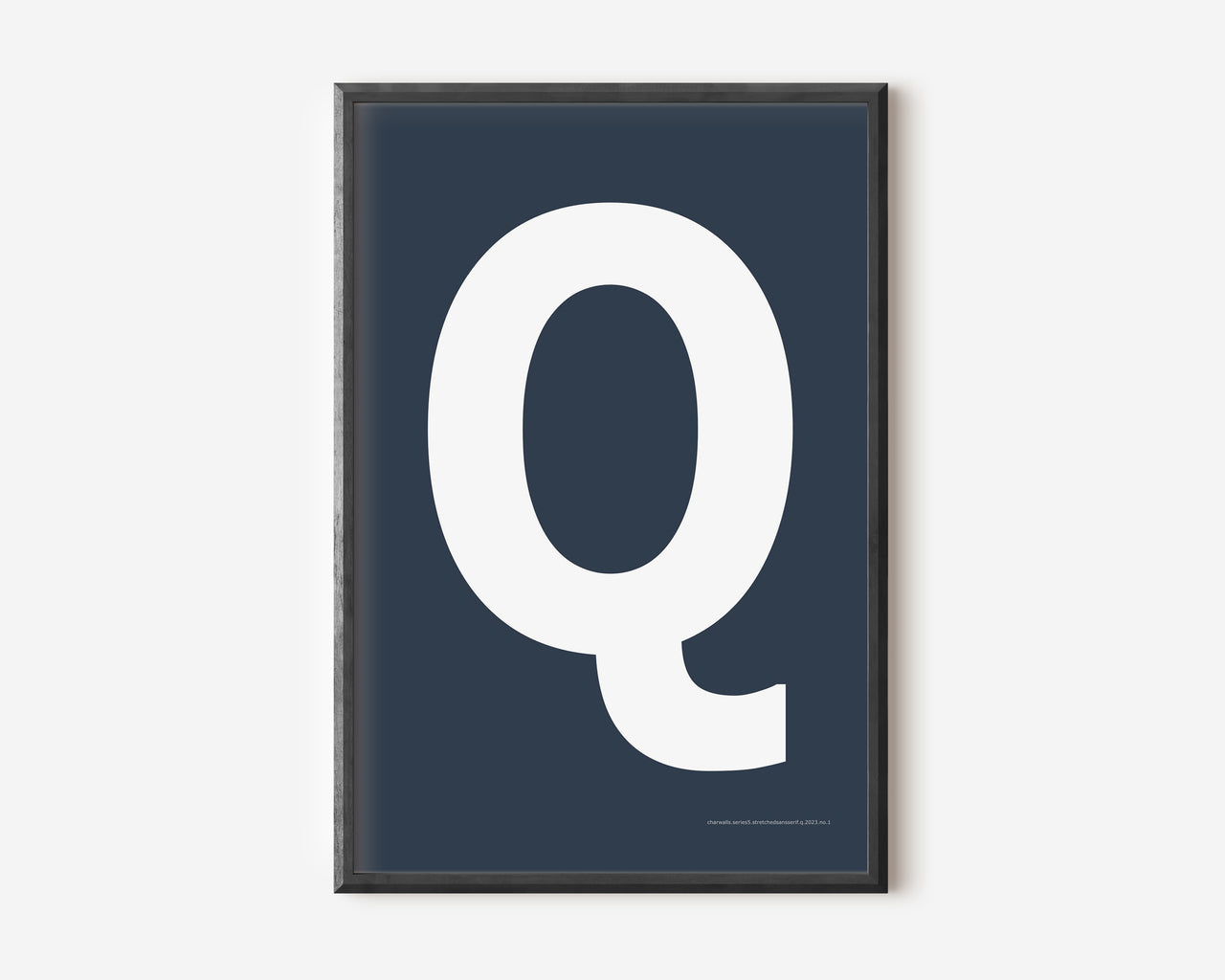 Modern art print with an uppercase white letter Q on a navy blue background.