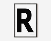 Modern art print with an uppercase black letter R on a white background.