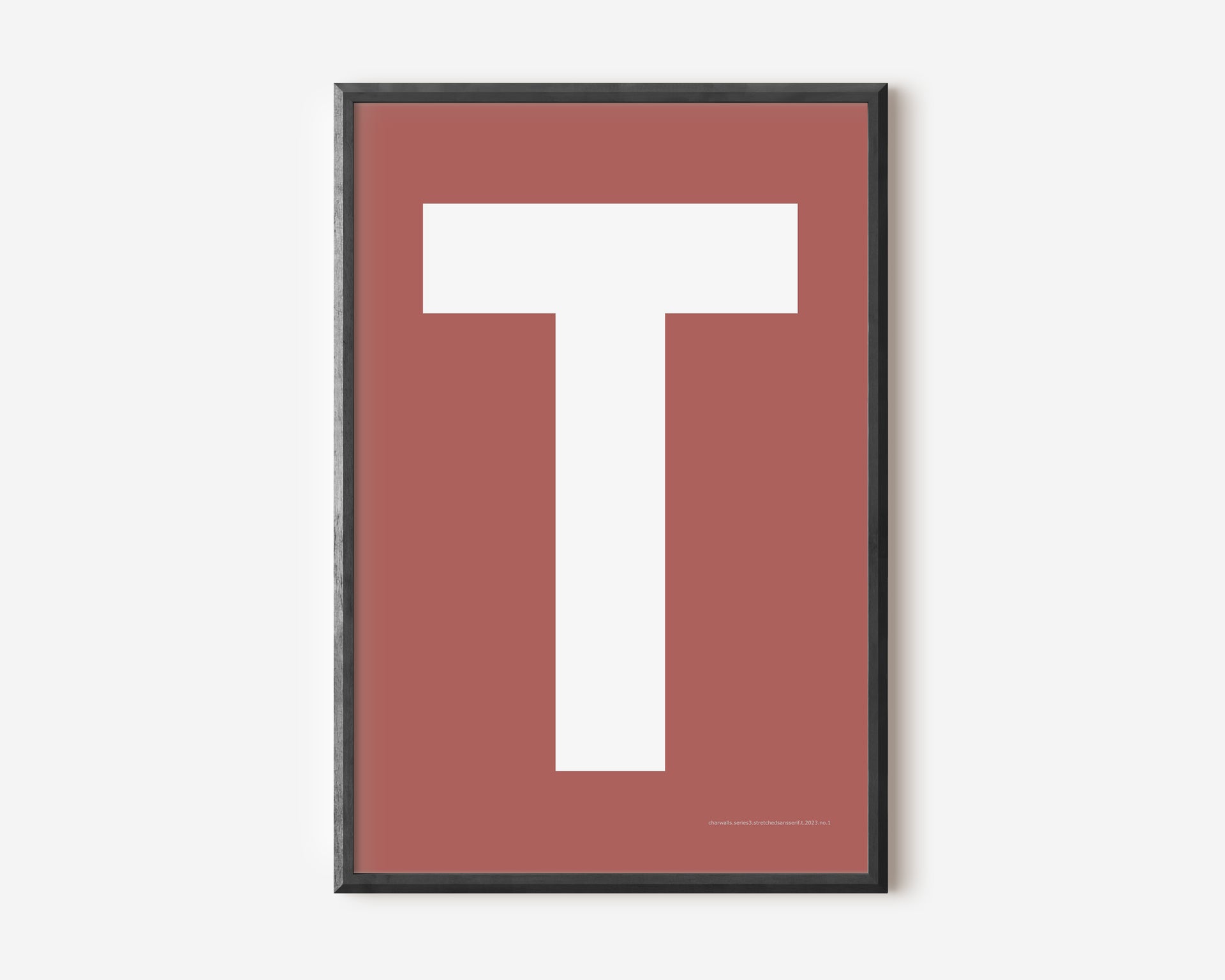 Modern art print with an uppercase white letter T on a Nantucket red background.