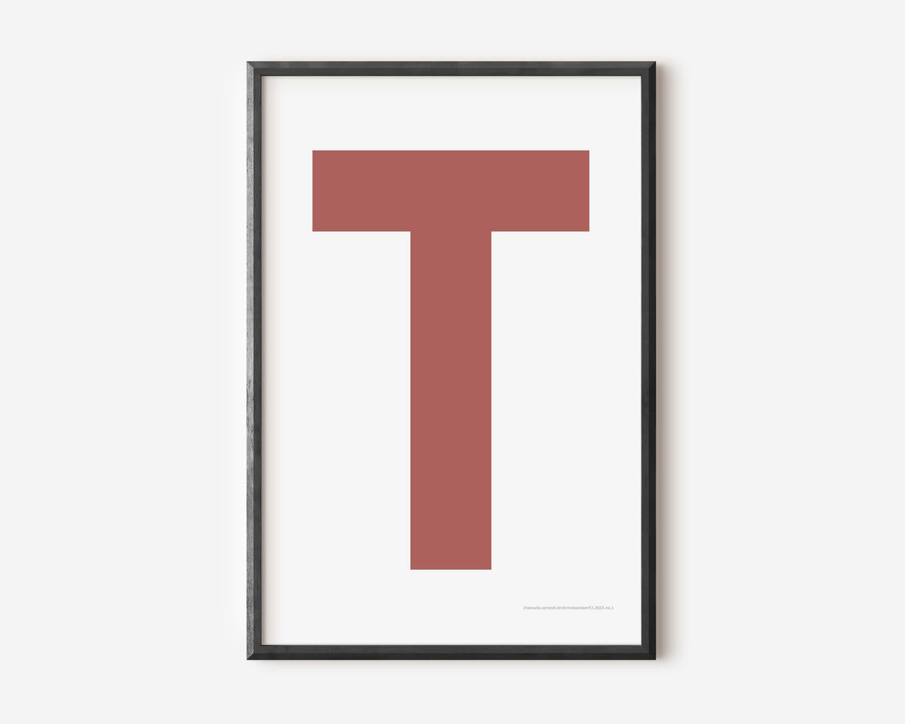 Modern art print with an uppercase Nantucket red letter T on a white background.