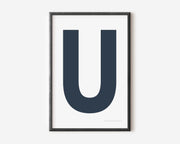 Modern art print with an uppercase navy blue letter U on a white background.