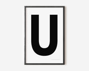 Modern art print with an uppercase black letter U on a white background.