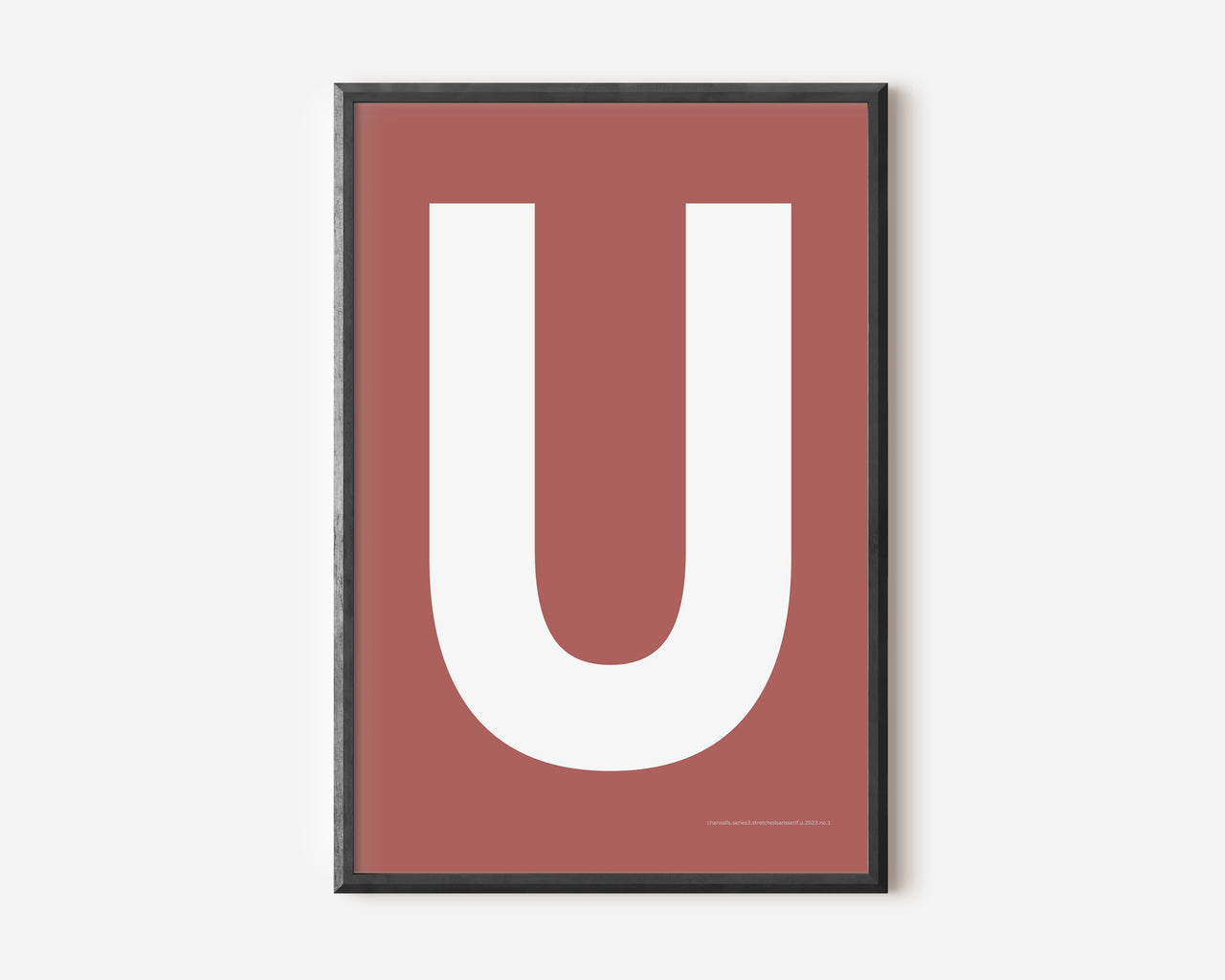 Modern art print with an uppercase white letter U on a Nantucket red background.