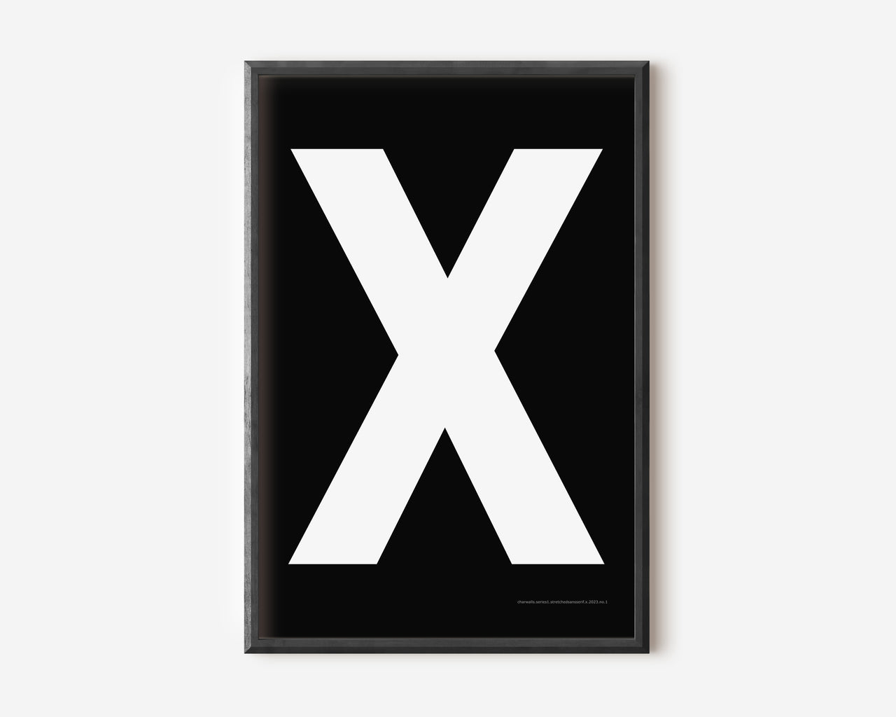 Modern art print with an uppercase white letter X on a black background.
