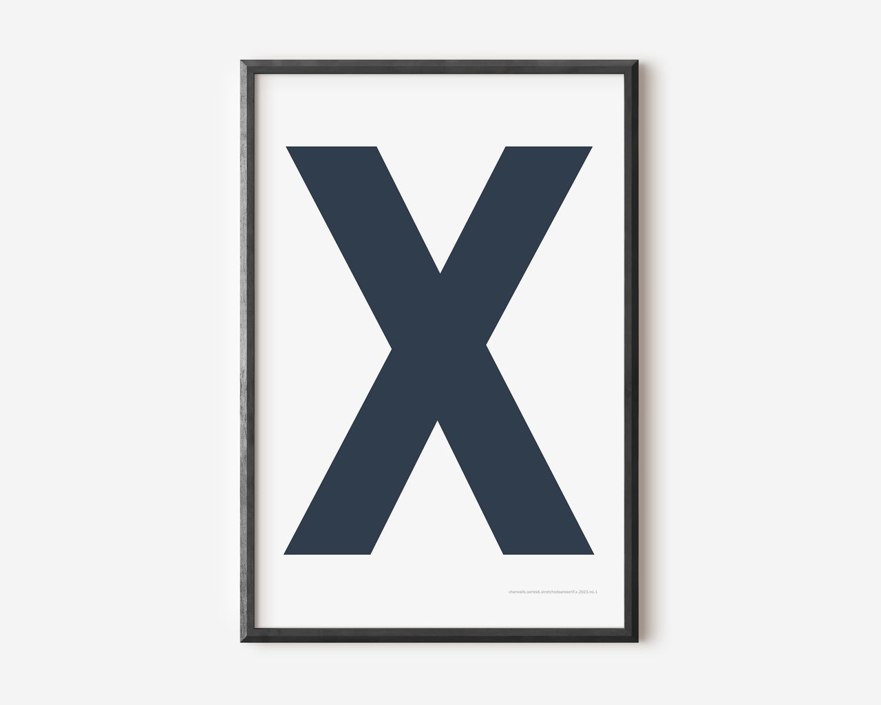 Modern art print with an uppercase navy blue letter X on a white background.