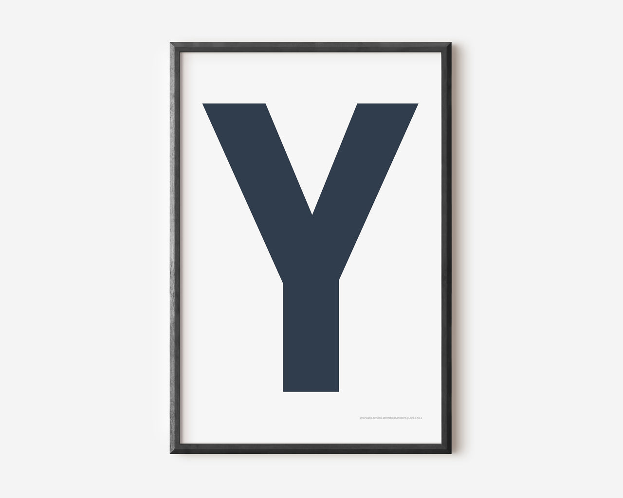Modern art print with an uppercase navy blue letter Y on a white background.