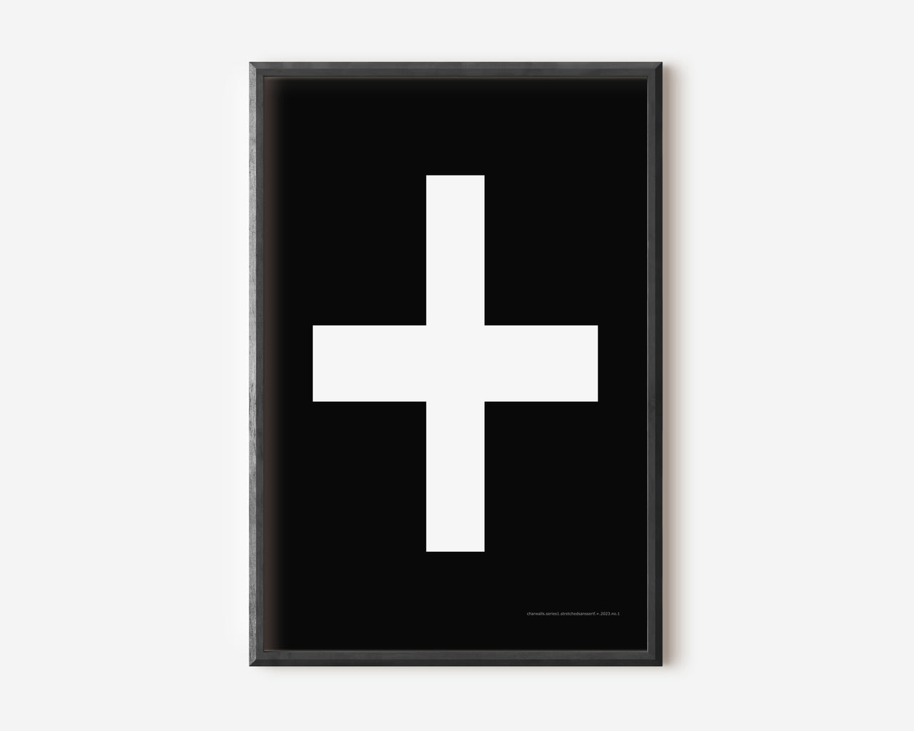 Modern symbol art print with a white plus sign on a black background.