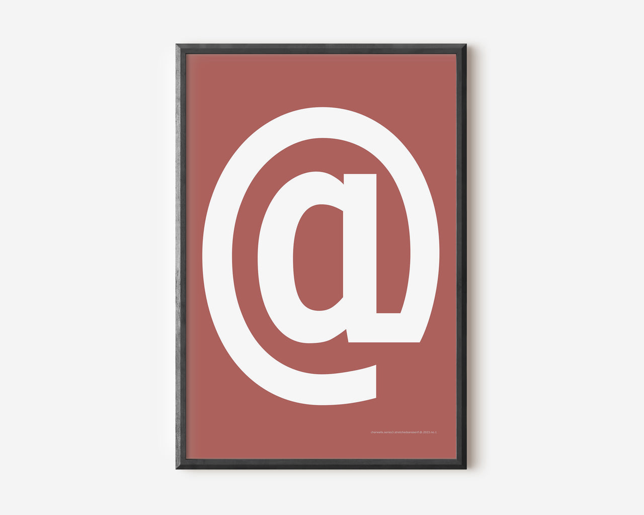 Modern symbol art print with a white at sign on a Nantucket red background.